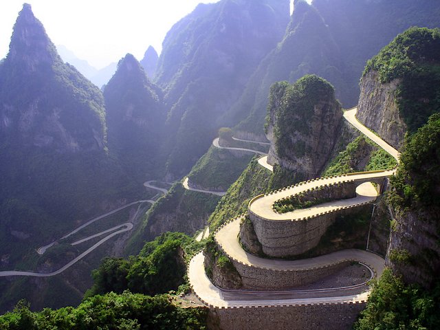 Avenue Towards Heaven Tianmen Mountain National Park Zhangjiajie Hunan China Wallpaper - Wallpaper with the scenic area of the 'Avenue Towards Heaven' (known as the Big Gate Road), one of the scariest road in the world, which is located within the Tianmen Mountain National Park, Zhangjiajie, in northwestern Hunan Province of China. The 'Avenue Towards Heaven', also called 'the road of the 99 turns', is a wonderful road that rises from 200 m to 1300 м above the sea level the Tianmen mountain, very near to the top. Its building was started in 1998 and was completed eight years later. - , avenue, avenues, Heaven, Tianmen, Mountain, mountains, National, Park, parks, Zhangjiajie, Hunan, China, wallpaper, wallpapers, nature, natures, places, place, travel, travels, tour, tours, trip, trips, scenic, area, areas, Big, Gate, gates, Road, roads, scariest, world, worlds, northwestern, province, provinces, road, roads, turns, turn, wonderful, sea, level, levels, top, tops, 1998, years, year - Wallpaper with the scenic area of the 'Avenue Towards Heaven' (known as the Big Gate Road), one of the scariest road in the world, which is located within the Tianmen Mountain National Park, Zhangjiajie, in northwestern Hunan Province of China. The 'Avenue Towards Heaven', also called 'the road of the 99 turns', is a wonderful road that rises from 200 m to 1300 м above the sea level the Tianmen mountain, very near to the top. Its building was started in 1998 and was completed eight years later. Подреждайте безплатни онлайн Avenue Towards Heaven Tianmen Mountain National Park Zhangjiajie Hunan China Wallpaper пъзел игри или изпратете Avenue Towards Heaven Tianmen Mountain National Park Zhangjiajie Hunan China Wallpaper пъзел игра поздравителна картичка  от puzzles-games.eu.. Avenue Towards Heaven Tianmen Mountain National Park Zhangjiajie Hunan China Wallpaper пъзел, пъзели, пъзели игри, puzzles-games.eu, пъзел игри, online пъзел игри, free пъзел игри, free online пъзел игри, Avenue Towards Heaven Tianmen Mountain National Park Zhangjiajie Hunan China Wallpaper free пъзел игра, Avenue Towards Heaven Tianmen Mountain National Park Zhangjiajie Hunan China Wallpaper online пъзел игра, jigsaw puzzles, Avenue Towards Heaven Tianmen Mountain National Park Zhangjiajie Hunan China Wallpaper jigsaw puzzle, jigsaw puzzle games, jigsaw puzzles games, Avenue Towards Heaven Tianmen Mountain National Park Zhangjiajie Hunan China Wallpaper пъзел игра картичка, пъзели игри картички, Avenue Towards Heaven Tianmen Mountain National Park Zhangjiajie Hunan China Wallpaper пъзел игра поздравителна картичка