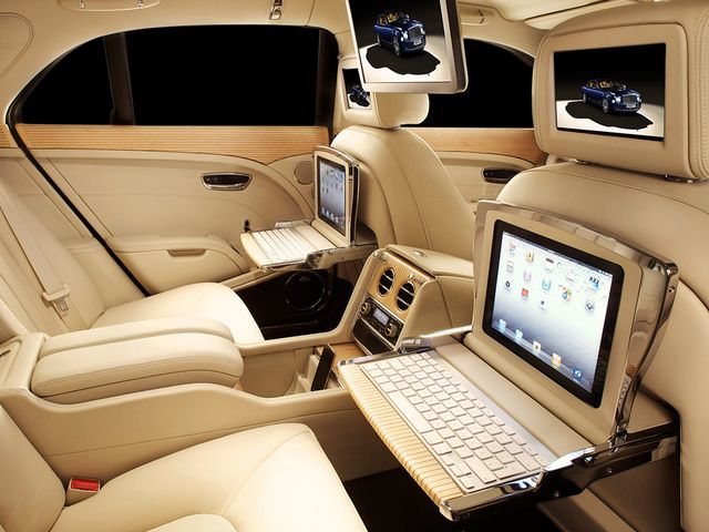 Bentley Mulsanne Executive Interior 2012 Geneva Auto Show - An executive interior in a luxurious, handcrafted cabin of Bentley Mulsanne, unveiled at the Geneva Auto Show (March 2012), with many high technologies, which are centralized in a comfortable mobile office, in assistance of executives while on the road. At the rear passenger area, there are three LCD screens, powered by an  Apple Mac computer mounted in the trunk, individual workstations Apple iPad with full internet access (integrated into fold-down tables), connected through Bluetooth keyboards. A large, centrally mounted, 15.6-inch high-def LED screen, which is suited for DVD and Television viewing, ensures a wide selection of movies. - , Bentley, Mulsanne, executive, interior, interiors, 2012, Geneva, auto, autos, show, shows, cars, car, automobiles, automobile, travel, travels, tour, tours, trip, trips, luxurious, handcrafted, cabin, cabins, March, high, technologies, technology, comfortable, mobile, office, offices, assistance, assistances, executives, road, roads, rear, passenger, area, areas, LCD, screens, screen, Apple, Mac, computer, computers, trunk, trunks, individual, workstations, workstation, iPad, internet, access, Bluetooth, keyboards, keyboard, DVD, television, selection, movies, movie - An executive interior in a luxurious, handcrafted cabin of Bentley Mulsanne, unveiled at the Geneva Auto Show (March 2012), with many high technologies, which are centralized in a comfortable mobile office, in assistance of executives while on the road. At the rear passenger area, there are three LCD screens, powered by an  Apple Mac computer mounted in the trunk, individual workstations Apple iPad with full internet access (integrated into fold-down tables), connected through Bluetooth keyboards. A large, centrally mounted, 15.6-inch high-def LED screen, which is suited for DVD and Television viewing, ensures a wide selection of movies. Подреждайте безплатни онлайн Bentley Mulsanne Executive Interior 2012 Geneva Auto Show пъзел игри или изпратете Bentley Mulsanne Executive Interior 2012 Geneva Auto Show пъзел игра поздравителна картичка  от puzzles-games.eu.. Bentley Mulsanne Executive Interior 2012 Geneva Auto Show пъзел, пъзели, пъзели игри, puzzles-games.eu, пъзел игри, online пъзел игри, free пъзел игри, free online пъзел игри, Bentley Mulsanne Executive Interior 2012 Geneva Auto Show free пъзел игра, Bentley Mulsanne Executive Interior 2012 Geneva Auto Show online пъзел игра, jigsaw puzzles, Bentley Mulsanne Executive Interior 2012 Geneva Auto Show jigsaw puzzle, jigsaw puzzle games, jigsaw puzzles games, Bentley Mulsanne Executive Interior 2012 Geneva Auto Show пъзел игра картичка, пъзели игри картички, Bentley Mulsanne Executive Interior 2012 Geneva Auto Show пъзел игра поздравителна картичка