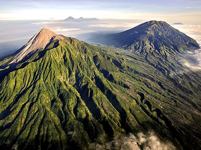 Volcano Indonesia Mount Merapi Aerial View - An aerial view on Mount Merapi with one of the most active of 69 volcanoes in Indonesia, which lies in a very densely populated area, near the Yogyakarta in a region known as the 'Pacific Ring of Fire'. - , volcano, volcanoes, Indonesia, Mount, Merapi, aerial, view, views, nature, natures, active, densely, populated, area, areas, Yogyakarta, region, regions, known, Pacific, Ring, Fire, rings, fires - An aerial view on Mount Merapi with one of the most active of 69 volcanoes in Indonesia, which lies in a very densely populated area, near the Yogyakarta in a region known as the 'Pacific Ring of Fire'. Решайте бесплатные онлайн Volcano Indonesia Mount Merapi Aerial View пазлы игры или отправьте Volcano Indonesia Mount Merapi Aerial View пазл игру приветственную открытку  из puzzles-games.eu.. Volcano Indonesia Mount Merapi Aerial View пазл, пазлы, пазлы игры, puzzles-games.eu, пазл игры, онлайн пазл игры, игры пазлы бесплатно, бесплатно онлайн пазл игры, Volcano Indonesia Mount Merapi Aerial View бесплатно пазл игра, Volcano Indonesia Mount Merapi Aerial View онлайн пазл игра , jigsaw puzzles, Volcano Indonesia Mount Merapi Aerial View jigsaw puzzle, jigsaw puzzle games, jigsaw puzzles games, Volcano Indonesia Mount Merapi Aerial View пазл игра открытка, пазлы игры открытки, Volcano Indonesia Mount Merapi Aerial View пазл игра приветственная открытка