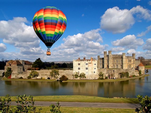 Hot Air Balloon over Leeds Castle Kent England - A flight with a hot air balloon which offers an exhilarating experience over the Leeds castle, one of the most romantic castles in England and the loveliest castle in the world. Leeds Castle is situated at the stunning countryside, set on two islands on the River Len, among 500 acres of beautiful parkland in the heart of Kent, England, 5 miles (8 km) southeast of Maidstone. It was built in 1119 by Henry VIII, as a home for Catherine of Aragon. The lake which surrounds the castle was created in 1278, when the castle became the property of King Edward I, to enhance its defences. Now it is open for entertaining guests with its 40 bedrooms, a 100-seater banquet hall, a maze, helipad and golf course, with a butler, chauffeur and chefs. - , hot, air, balloon, ballons, Leeds, castle, castles, Kent, England, places, place, travel, travels, tour, tours, trip, trips, exhilarating, experience, experiences, romantic, loveliest, world, worlds, stunning, countryside, countrysides, islands, island, river, rivers, Len, acres, acre, beautiful, parkland, parklands, heart, hearts, southeast, Maidstone, 1119, HenryVIII, home, homes, Catherine, Aragon, lake, lakes, 1278, property, properties, King, Edward, defences, defence, entertaining, guests, guest, bedrooms, bedroom, banquet, hall, halls, maze, mazes, helipad, helipads, golf, course, courses, butler, butlers, chauffeur, chauffeurs, chefs, chef - A flight with a hot air balloon which offers an exhilarating experience over the Leeds castle, one of the most romantic castles in England and the loveliest castle in the world. Leeds Castle is situated at the stunning countryside, set on two islands on the River Len, among 500 acres of beautiful parkland in the heart of Kent, England, 5 miles (8 km) southeast of Maidstone. It was built in 1119 by Henry VIII, as a home for Catherine of Aragon. The lake which surrounds the castle was created in 1278, when the castle became the property of King Edward I, to enhance its defences. Now it is open for entertaining guests with its 40 bedrooms, a 100-seater banquet hall, a maze, helipad and golf course, with a butler, chauffeur and chefs. Подреждайте безплатни онлайн Hot Air Balloon over Leeds Castle Kent England пъзел игри или изпратете Hot Air Balloon over Leeds Castle Kent England пъзел игра поздравителна картичка  от puzzles-games.eu.. Hot Air Balloon over Leeds Castle Kent England пъзел, пъзели, пъзели игри, puzzles-games.eu, пъзел игри, online пъзел игри, free пъзел игри, free online пъзел игри, Hot Air Balloon over Leeds Castle Kent England free пъзел игра, Hot Air Balloon over Leeds Castle Kent England online пъзел игра, jigsaw puzzles, Hot Air Balloon over Leeds Castle Kent England jigsaw puzzle, jigsaw puzzle games, jigsaw puzzles games, Hot Air Balloon over Leeds Castle Kent England пъзел игра картичка, пъзели игри картички, Hot Air Balloon over Leeds Castle Kent England пъзел игра поздравителна картичка