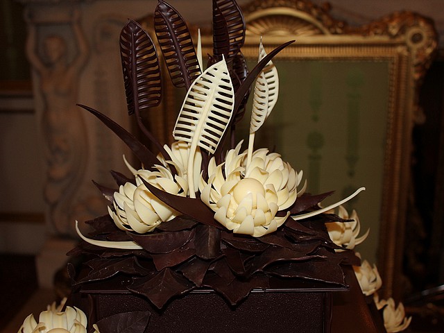 Royal Wedding Close-up of Chocolate Biscuit Cake by McVities for Guests in Buckingham Palace London England - Close-up on the top of a favorite chocolate biscuit cake from Prince William's childhood, an alternative to the traditional cake for guests on wedding reception in Buckingham Palace, London, England, at the afternoon on April 29, 2011. The cake was made by 'McVitie's Cake Company', according to an old recipe of the Royal Family from Rich Tea biscuits mixed with dark chocolate, covered in chocolate decoration in shape of flowers and leaves. - , Royal, wedding, weddings, close-up, chocolate, chocolates, biscuit, biscuits, cake, cakes, McVities, guests, guest, Buckingham, palace, palaces, London, England, food, foods, celebrities, celebrity, show, shows, ceremony, ceremonies, event, events, entertainment, entertainments, place, places, travel, travels, tour, tours, top, tops, favorite, prince, princes, William, childhood, alternative, alternatives, traditional, reception, receptions, afternoon, afternoons, April, 2011, company, companies, old, recipe, recipes, family, families, Rich, Tea, dark, decoration, decorations, flowers, flower, leaves, leaf - Close-up on the top of a favorite chocolate biscuit cake from Prince William's childhood, an alternative to the traditional cake for guests on wedding reception in Buckingham Palace, London, England, at the afternoon on April 29, 2011. The cake was made by 'McVitie's Cake Company', according to an old recipe of the Royal Family from Rich Tea biscuits mixed with dark chocolate, covered in chocolate decoration in shape of flowers and leaves. Решайте бесплатные онлайн Royal Wedding Close-up of Chocolate Biscuit Cake by McVities for Guests in Buckingham Palace London England пазлы игры или отправьте Royal Wedding Close-up of Chocolate Biscuit Cake by McVities for Guests in Buckingham Palace London England пазл игру приветственную открытку  из puzzles-games.eu.. Royal Wedding Close-up of Chocolate Biscuit Cake by McVities for Guests in Buckingham Palace London England пазл, пазлы, пазлы игры, puzzles-games.eu, пазл игры, онлайн пазл игры, игры пазлы бесплатно, бесплатно онлайн пазл игры, Royal Wedding Close-up of Chocolate Biscuit Cake by McVities for Guests in Buckingham Palace London England бесплатно пазл игра, Royal Wedding Close-up of Chocolate Biscuit Cake by McVities for Guests in Buckingham Palace London England онлайн пазл игра , jigsaw puzzles, Royal Wedding Close-up of Chocolate Biscuit Cake by McVities for Guests in Buckingham Palace London England jigsaw puzzle, jigsaw puzzle games, jigsaw puzzles games, Royal Wedding Close-up of Chocolate Biscuit Cake by McVities for Guests in Buckingham Palace London England пазл игра открытка, пазлы игры открытки, Royal Wedding Close-up of Chocolate Biscuit Cake by McVities for Guests in Buckingham Palace London England пазл игра приветственная открытка