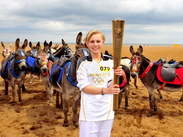 2012 London Olympics Torchbearer Starr Halley with Olympic Flame in Skegness England - Starr Halley, a 15-year-old student in King Edward VI Humanities College in Spilsby, with Olympic Flame in Skegness, England, a seaside town and resort in East Lindsey, on Lincolnshire coast of the North Sea (June 27, 2012) . She is one of 8,000 torchbearers in Torch Relay, which continued 70 days, traveled 8,000 miles and marked the start of the London Olympics. Starr Halley was diagnosed with a malignant brain tumour in 2009 and underwent a surgery and treatment. - , 2012, London, Olympics, torchbearer, torchbearers, Starr, Halley, Olympic, flame, flames, Skegness, England, show, shows, sport, sports, places, place, travel, travels, tour, tours, trip, trips, student, students, King, Edward, Humanities, college, colleges, Spilsby, seaside, town, towns, resort, resorts, East, Lindsey, Lincolnshire, North, Sea, June, torch, torches, relay, relays, days, day, miles, mile, start, stars, malignant, brain, brains, tumour, tumors, 2009, surgery, surgeries, treatment, treatments - Starr Halley, a 15-year-old student in King Edward VI Humanities College in Spilsby, with Olympic Flame in Skegness, England, a seaside town and resort in East Lindsey, on Lincolnshire coast of the North Sea (June 27, 2012) . She is one of 8,000 torchbearers in Torch Relay, which continued 70 days, traveled 8,000 miles and marked the start of the London Olympics. Starr Halley was diagnosed with a malignant brain tumour in 2009 and underwent a surgery and treatment. Решайте бесплатные онлайн 2012 London Olympics Torchbearer Starr Halley with Olympic Flame in Skegness England пазлы игры или отправьте 2012 London Olympics Torchbearer Starr Halley with Olympic Flame in Skegness England пазл игру приветственную открытку  из puzzles-games.eu.. 2012 London Olympics Torchbearer Starr Halley with Olympic Flame in Skegness England пазл, пазлы, пазлы игры, puzzles-games.eu, пазл игры, онлайн пазл игры, игры пазлы бесплатно, бесплатно онлайн пазл игры, 2012 London Olympics Torchbearer Starr Halley with Olympic Flame in Skegness England бесплатно пазл игра, 2012 London Olympics Torchbearer Starr Halley with Olympic Flame in Skegness England онлайн пазл игра , jigsaw puzzles, 2012 London Olympics Torchbearer Starr Halley with Olympic Flame in Skegness England jigsaw puzzle, jigsaw puzzle games, jigsaw puzzles games, 2012 London Olympics Torchbearer Starr Halley with Olympic Flame in Skegness England пазл игра открытка, пазлы игры открытки, 2012 London Olympics Torchbearer Starr Halley with Olympic Flame in Skegness England пазл игра приветственная открытка