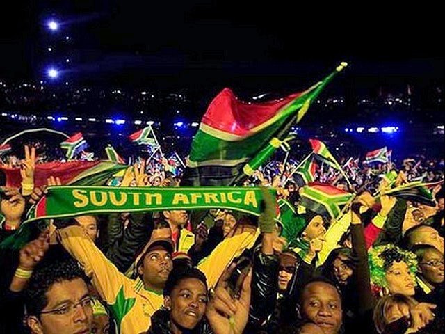 World Cup 2010 Kick-off Concert Fans - Fans wave flags and raise scarves during the Kick-off Celebration concert for the FIFA World Cup 2010 at the Orlando stadium in Soweto, Johannesburg, South Africa (June 10, 2010). - , World, Cup, 2010, Kick-off, concert, concerts, fans, fan, show, shows, performance, performances, sport, sports, tournament, tournaments, qualification, qualifications, ceremony, ceremonies, flags, flag, scarve, scarves, celebration, FIFA, Orlando, stadium, stadiums, Soweto, Johannesburg, South, Africa - Fans wave flags and raise scarves during the Kick-off Celebration concert for the FIFA World Cup 2010 at the Orlando stadium in Soweto, Johannesburg, South Africa (June 10, 2010). Решайте бесплатные онлайн World Cup 2010 Kick-off Concert Fans пазлы игры или отправьте World Cup 2010 Kick-off Concert Fans пазл игру приветственную открытку  из puzzles-games.eu.. World Cup 2010 Kick-off Concert Fans пазл, пазлы, пазлы игры, puzzles-games.eu, пазл игры, онлайн пазл игры, игры пазлы бесплатно, бесплатно онлайн пазл игры, World Cup 2010 Kick-off Concert Fans бесплатно пазл игра, World Cup 2010 Kick-off Concert Fans онлайн пазл игра , jigsaw puzzles, World Cup 2010 Kick-off Concert Fans jigsaw puzzle, jigsaw puzzle games, jigsaw puzzles games, World Cup 2010 Kick-off Concert Fans пазл игра открытка, пазлы игры открытки, World Cup 2010 Kick-off Concert Fans пазл игра приветственная открытка